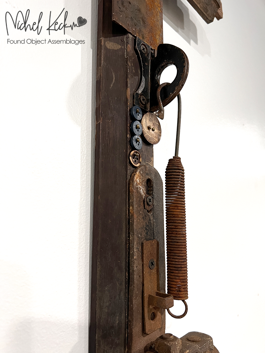 Cross Art from Rusted Old Metal and Reclaimed Wood made by artist Michel Keck. 